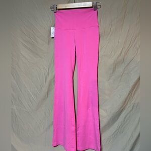 TNA flare pants